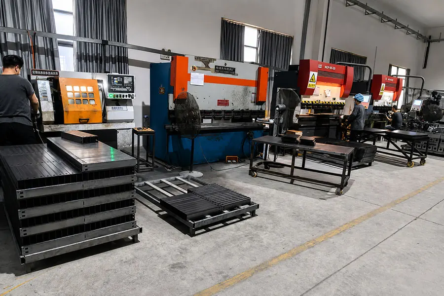 metal processing area for office desk frames and table components at onmuse